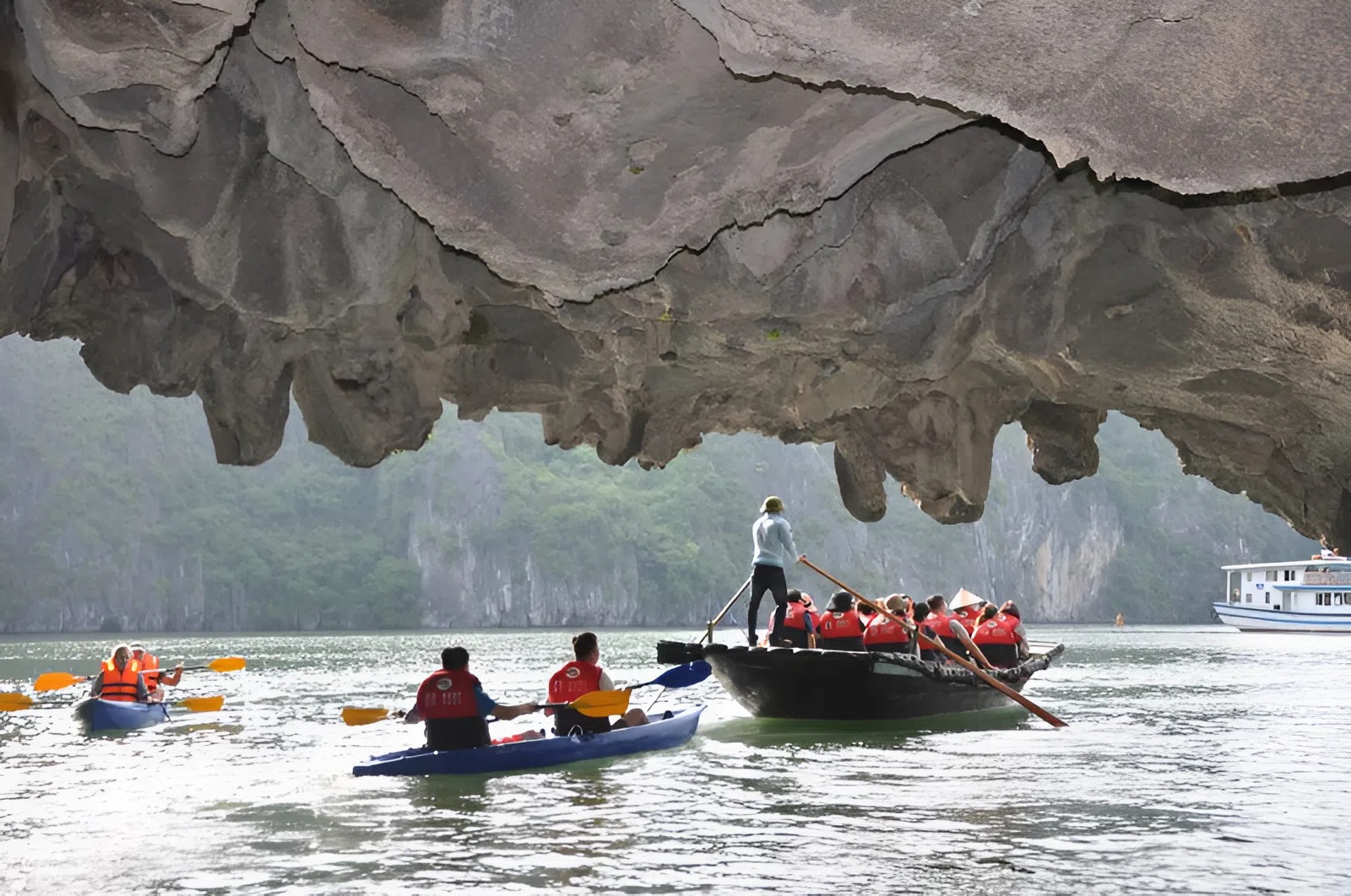 Visitors take traditional boat ride