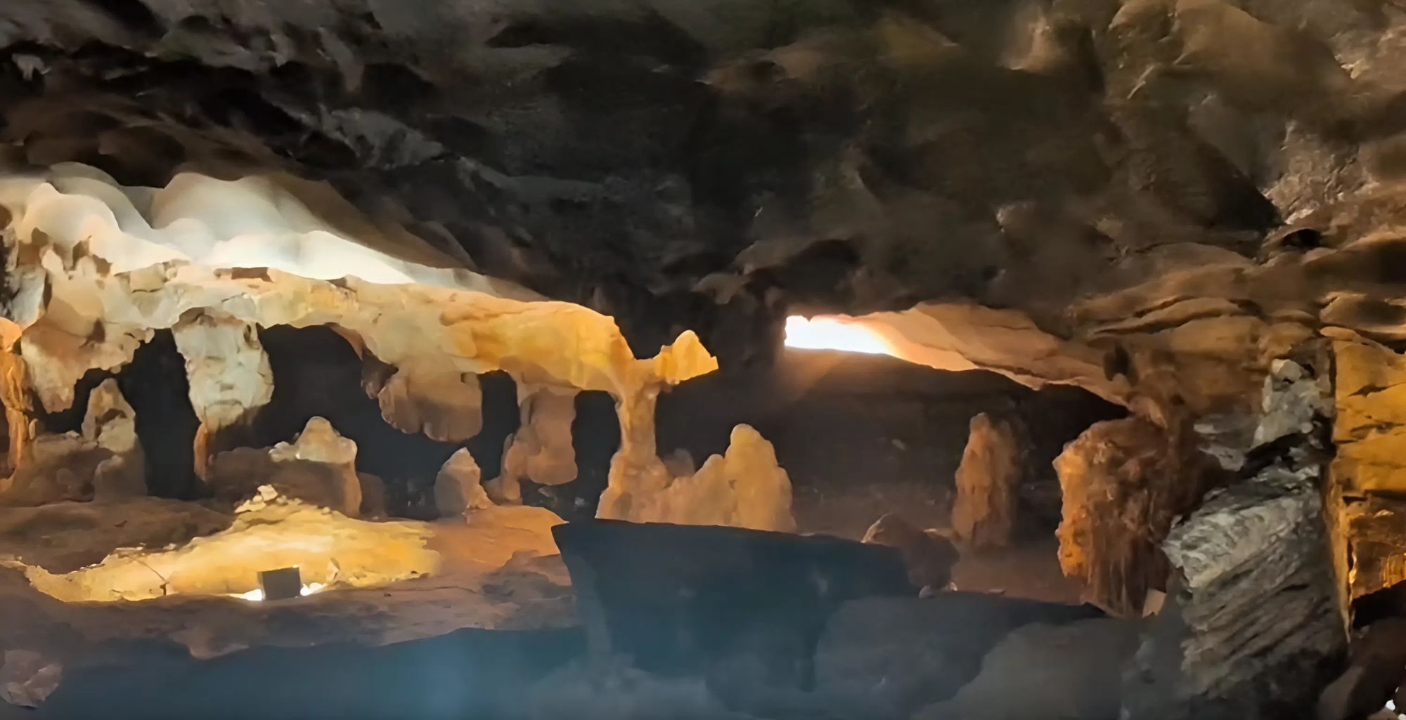 The first chamber with a carving of a strong young rooster facing a small freshwater lake